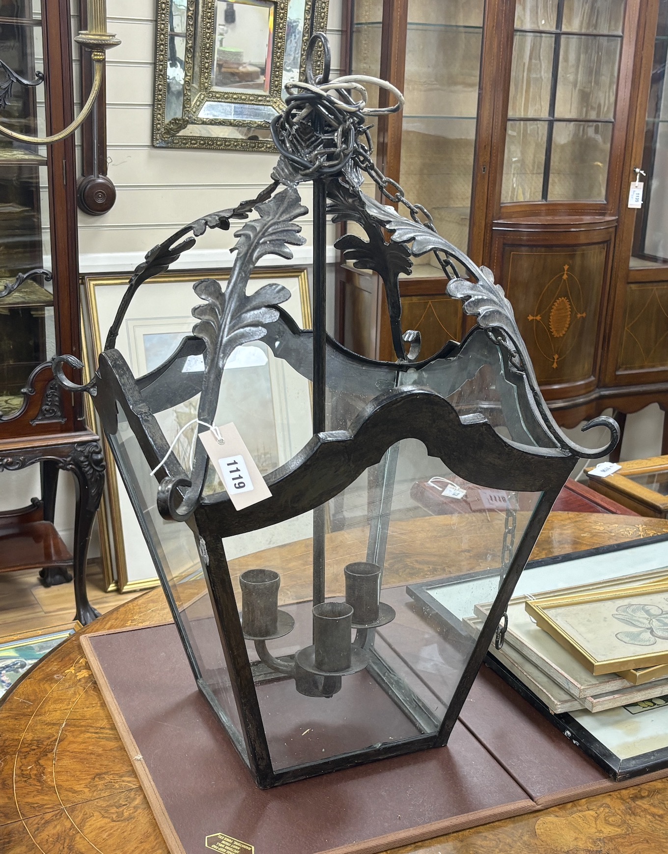 A Victorian style square wrought iron hall lantern, height 70cm